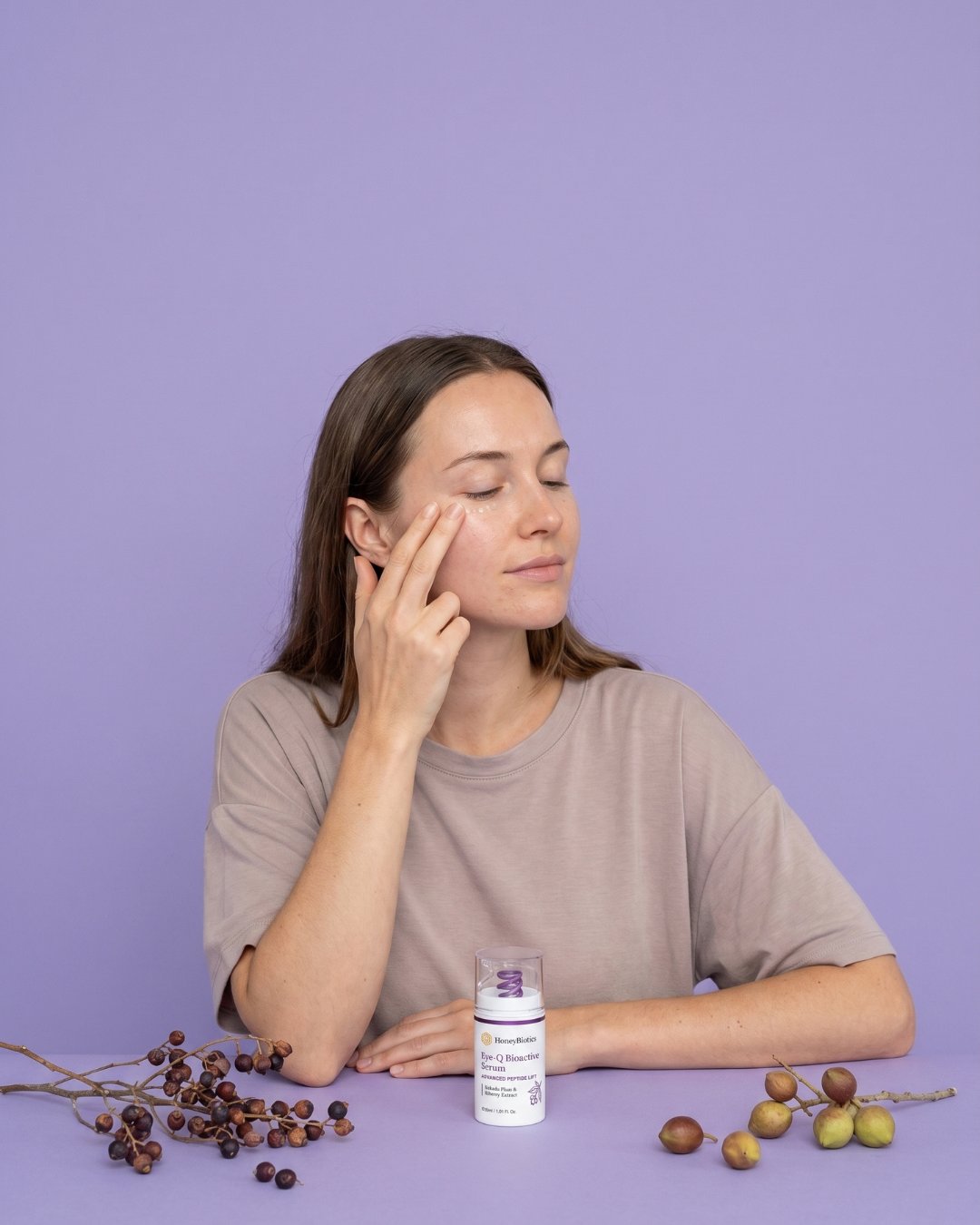 A quiet moment applying Eye-Q Bioactive Serum — two pumps, sixty seconds, twice a day
